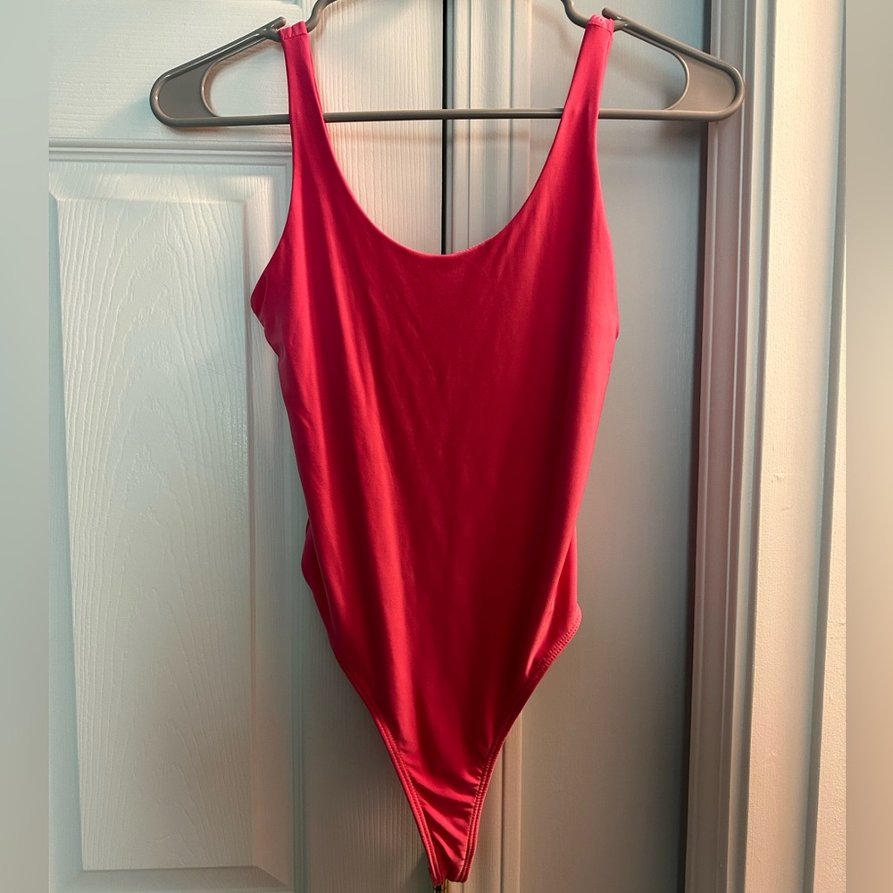 Pink bodysuit